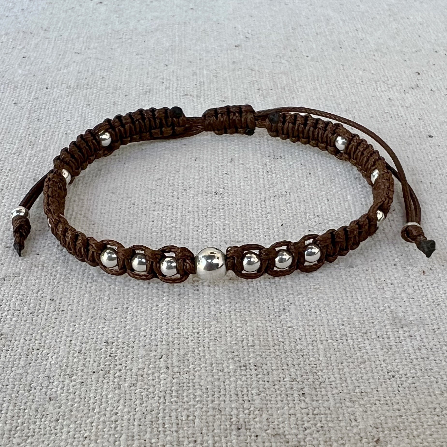 Pulsera en marrón y plata