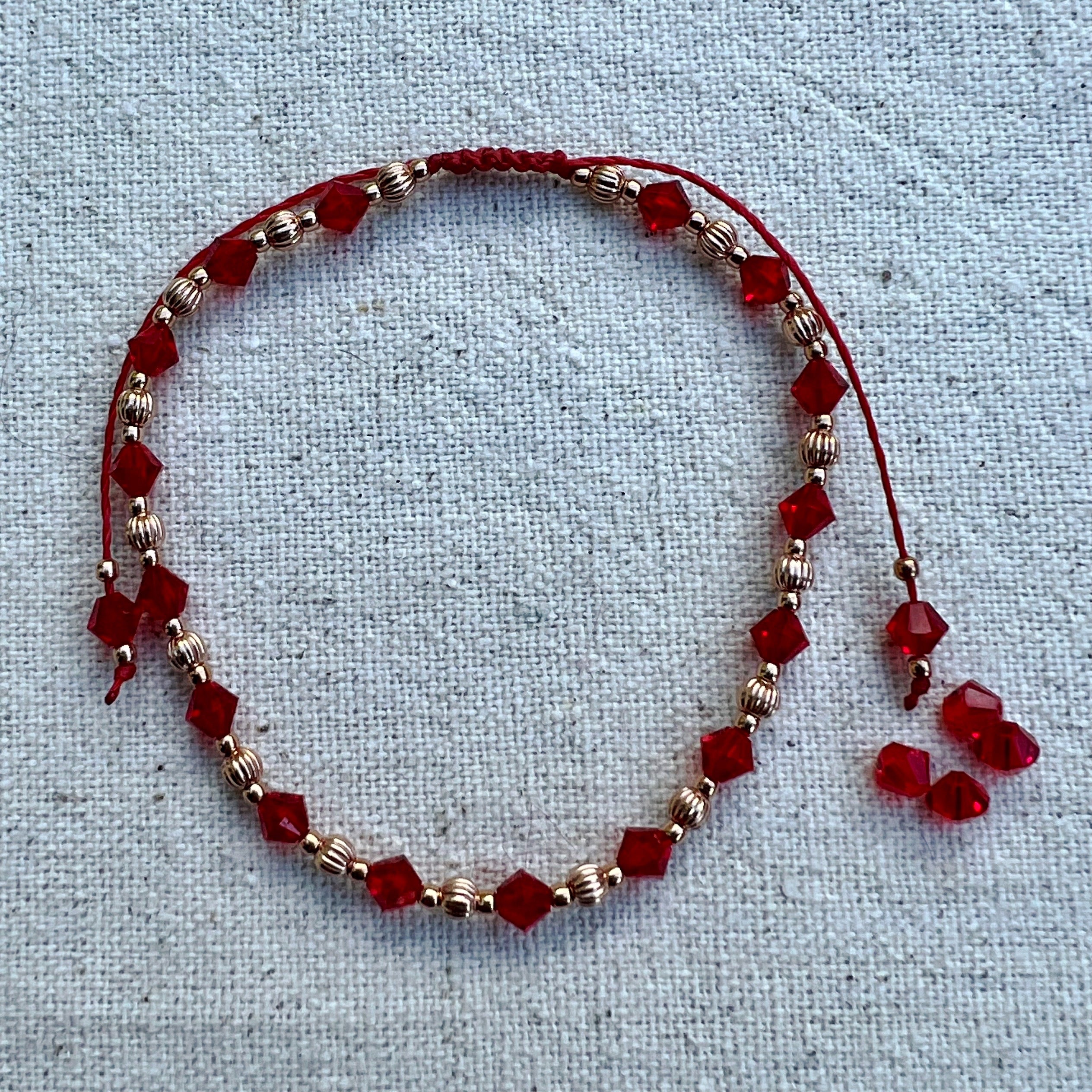 Pulsera roja con plata chapada oro rosa
